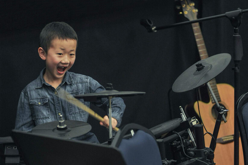 Student Plays Electronic Drums